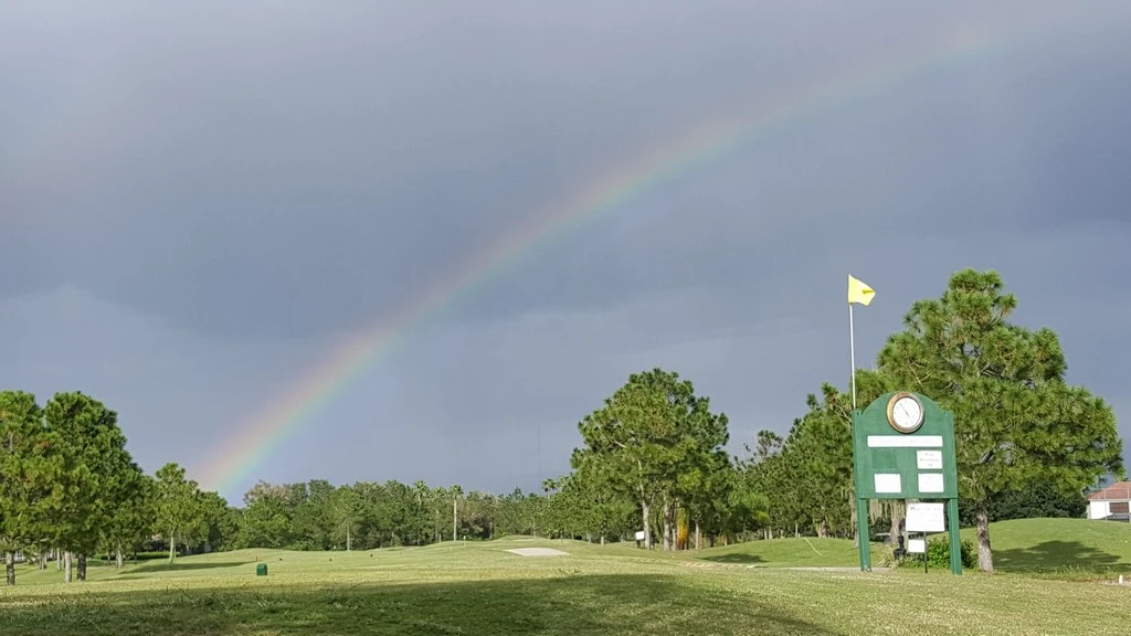 Rainbow over golf course