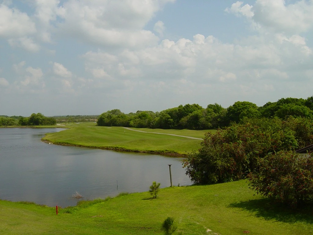 View of pond on golf course